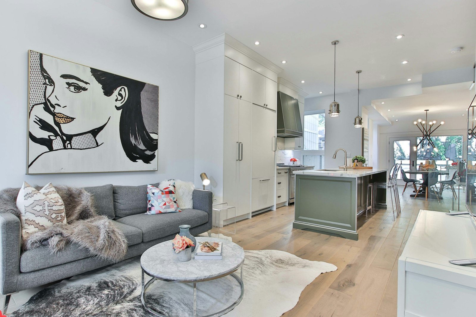 Kitchen with mixed storage and glass cabinets